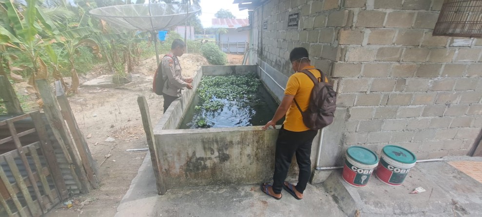 Bhabinkamtibmas Desa Kelawat Dukung Ketahanan Pangan Nasional Melalui Budidaya Kolam Ikan Nila